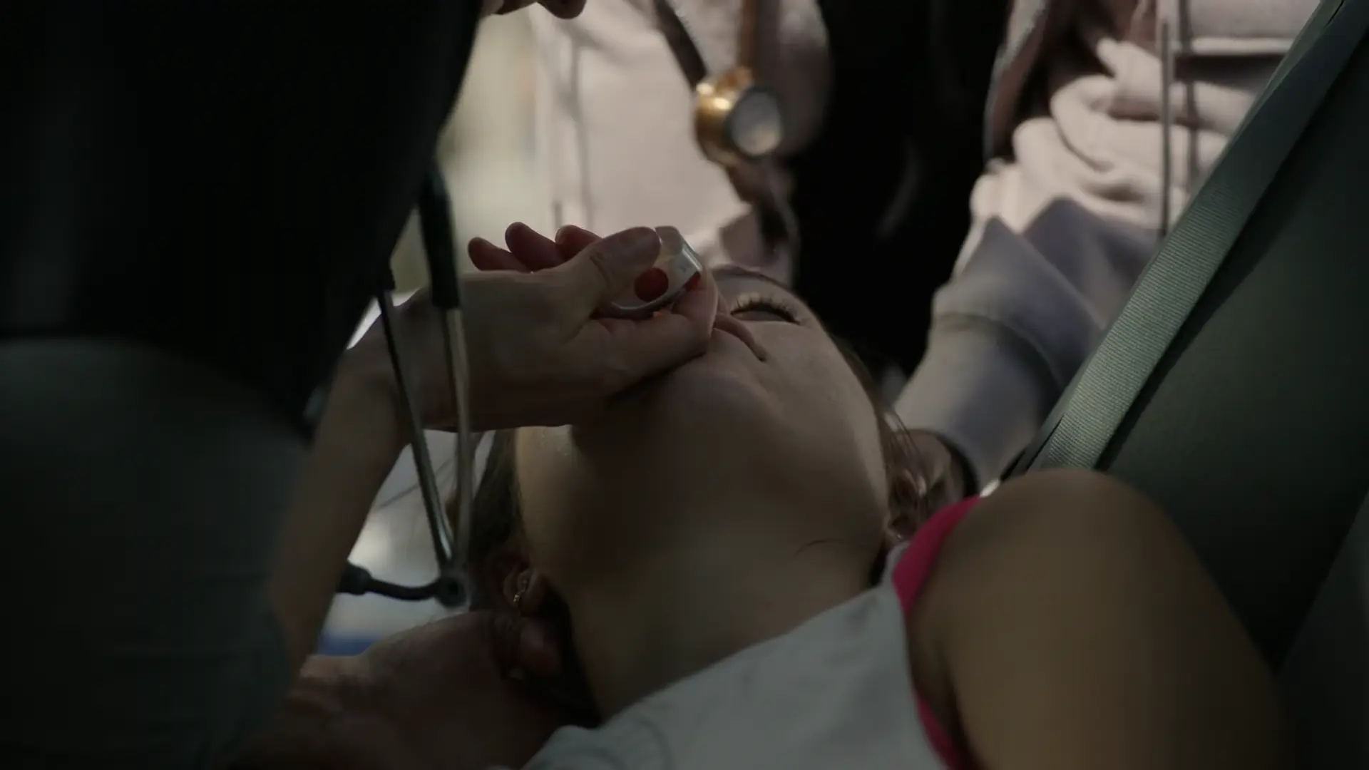 Dr. Cassie McKay administering intranasal Narcan.