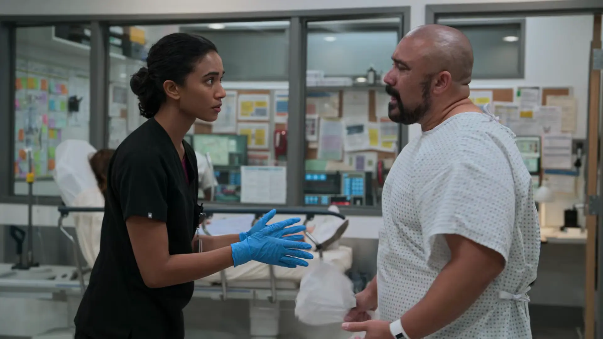 Dr. Mohan negotiating with Orlando as he attempts to leave AMA.