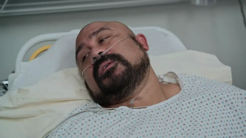 Orlando waking up and Dr. Mohan explaining the DKA episode to Orlando and his wife.