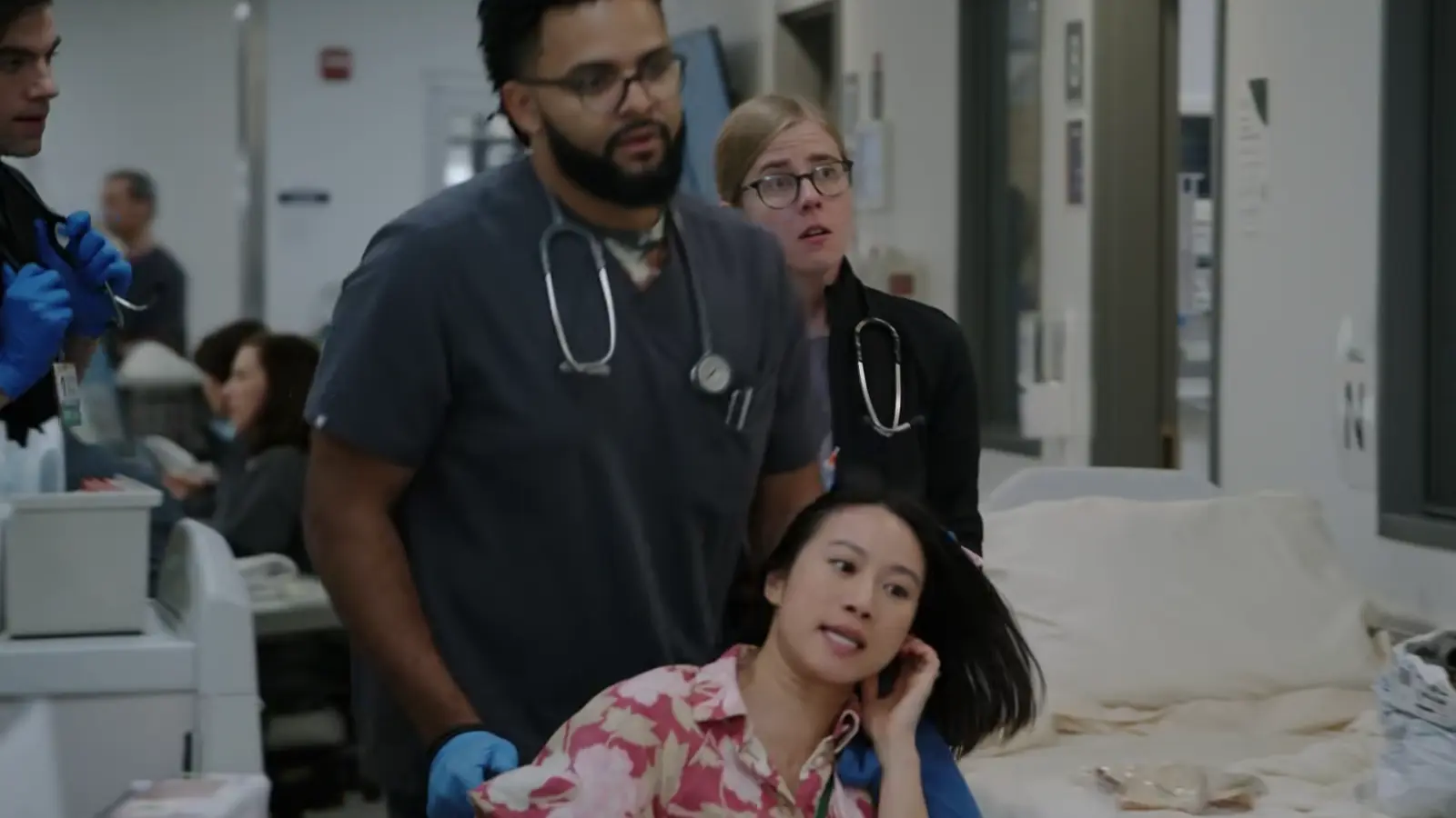 Patient anxiously clutching her left ear.